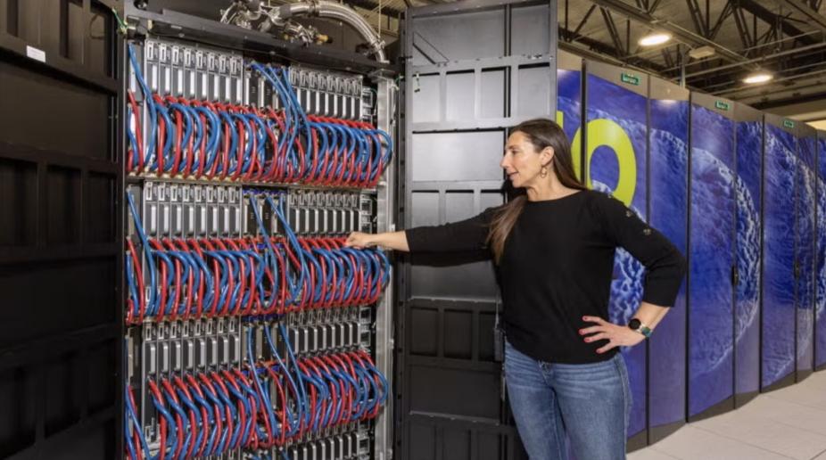 Summer Wasson showing Derecho hardware to tour visitors
